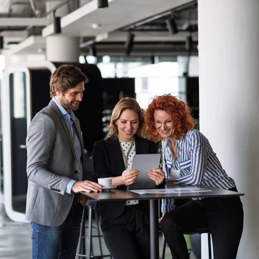 workers receiving AI training from boss