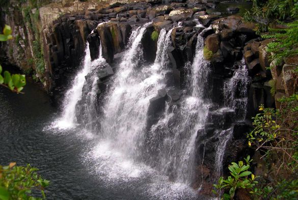 This may contain: a waterfall with lots of water coming out of it