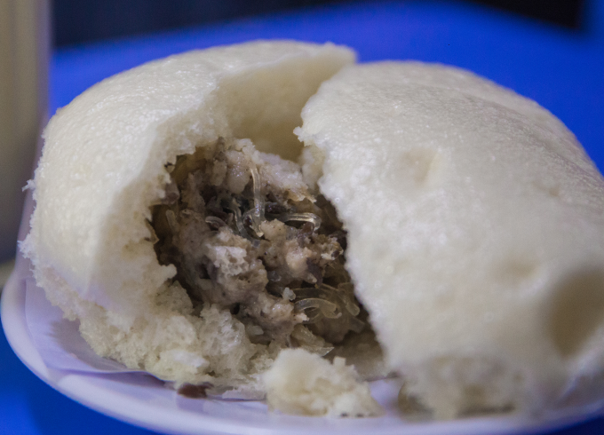 A steamed bun broken open. Photo by VnExpress/Xuan Phuong