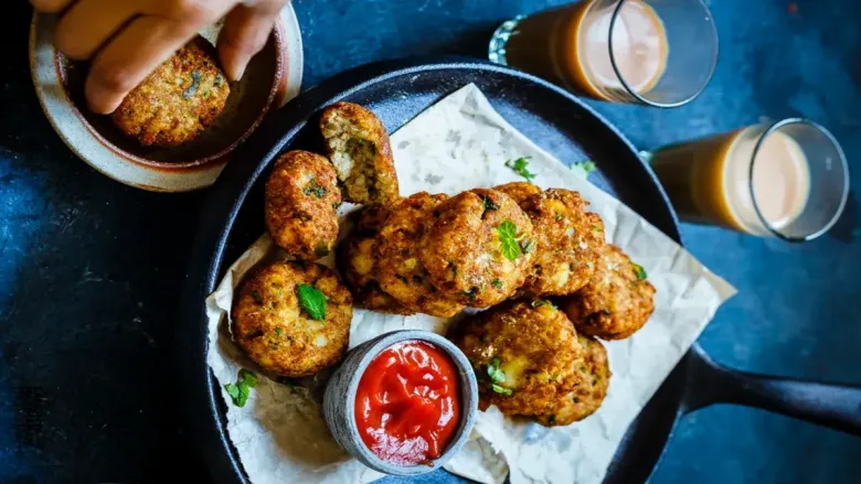 Soya tikki made with ground soybeans, mashed potatoes and spices, pan fried until crisp and golden.