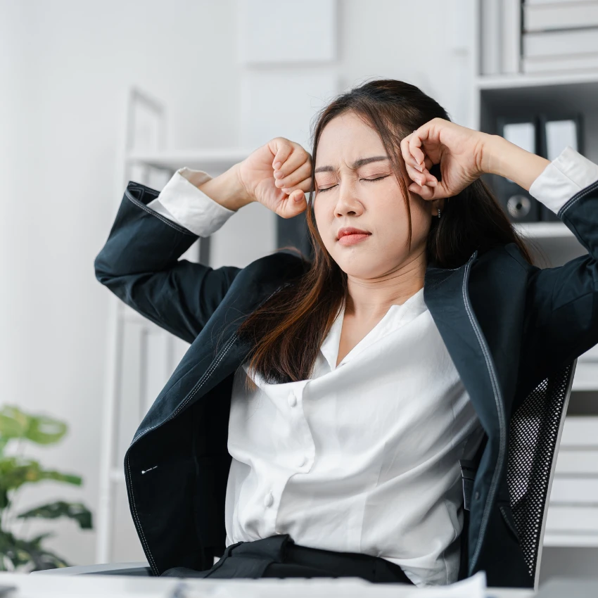stressed employee sitting at desk