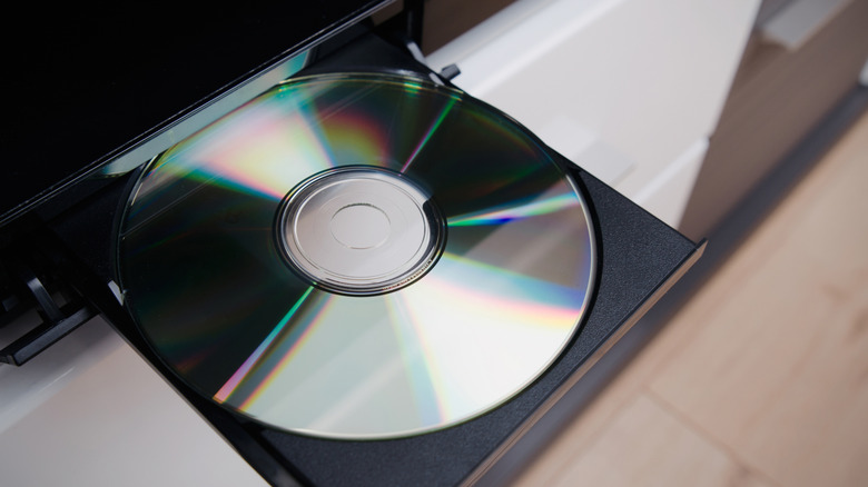 An opened disc tray on a media player.