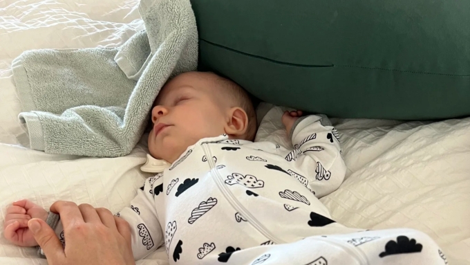 Before creating the Sleepy Hat, Holden would use a cloth to limit visual distractions during nap time for her son, Maxime. Photo courtesy of Julia Holden