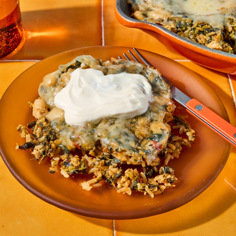 a recipe photo of the Cheesy White Bean & Rice Skillet Credit: Photographer: Jen Causey, Food Stylist: Julian Hensarling, Prop Stylist: Priscilla Montiel