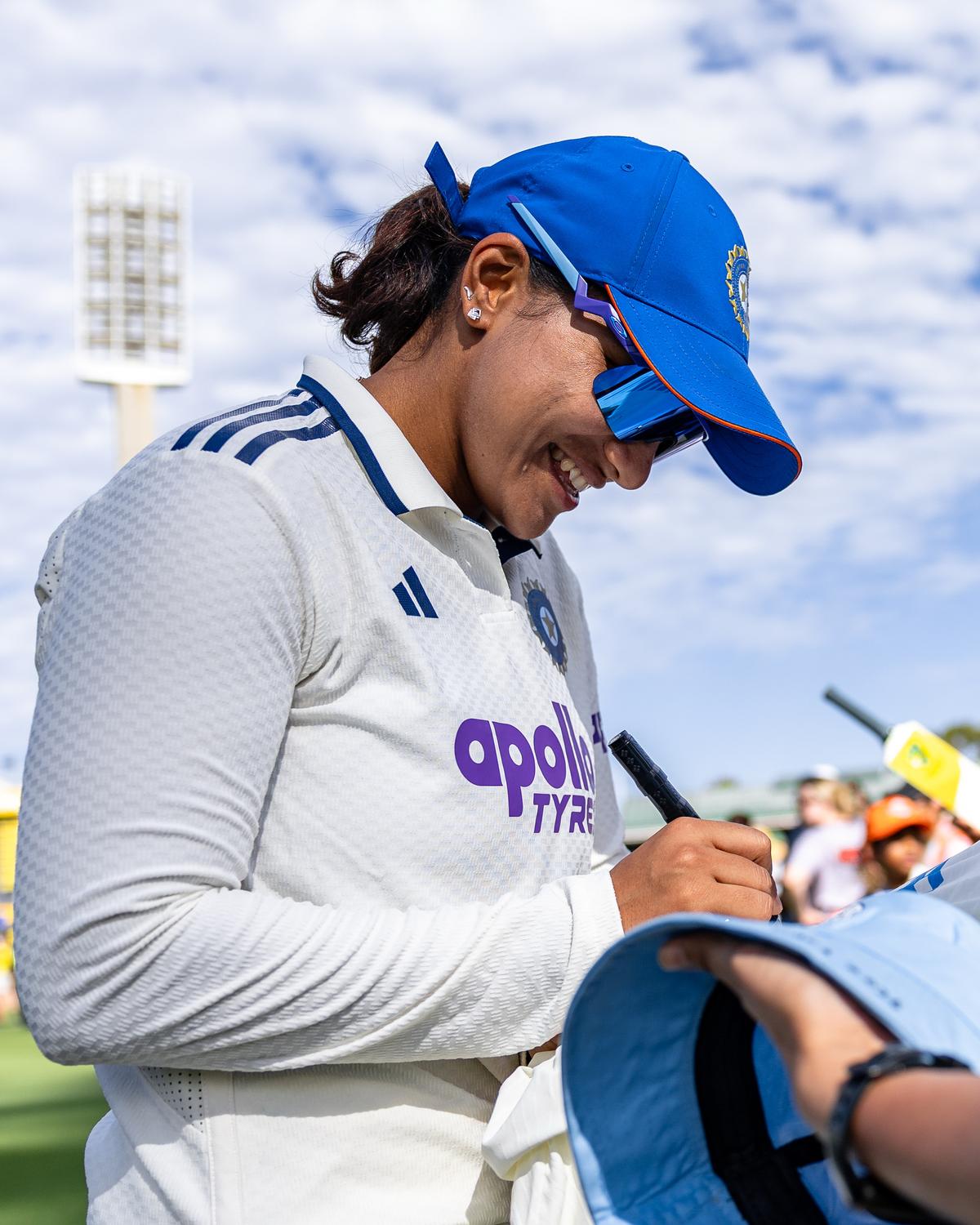 Sneh Rana signs autographs during Day 3 of the Test match between Australia and India earlier this month. Sneh Rana signs autographs during Day 3 of the Test match between Australia and India earlier this month.