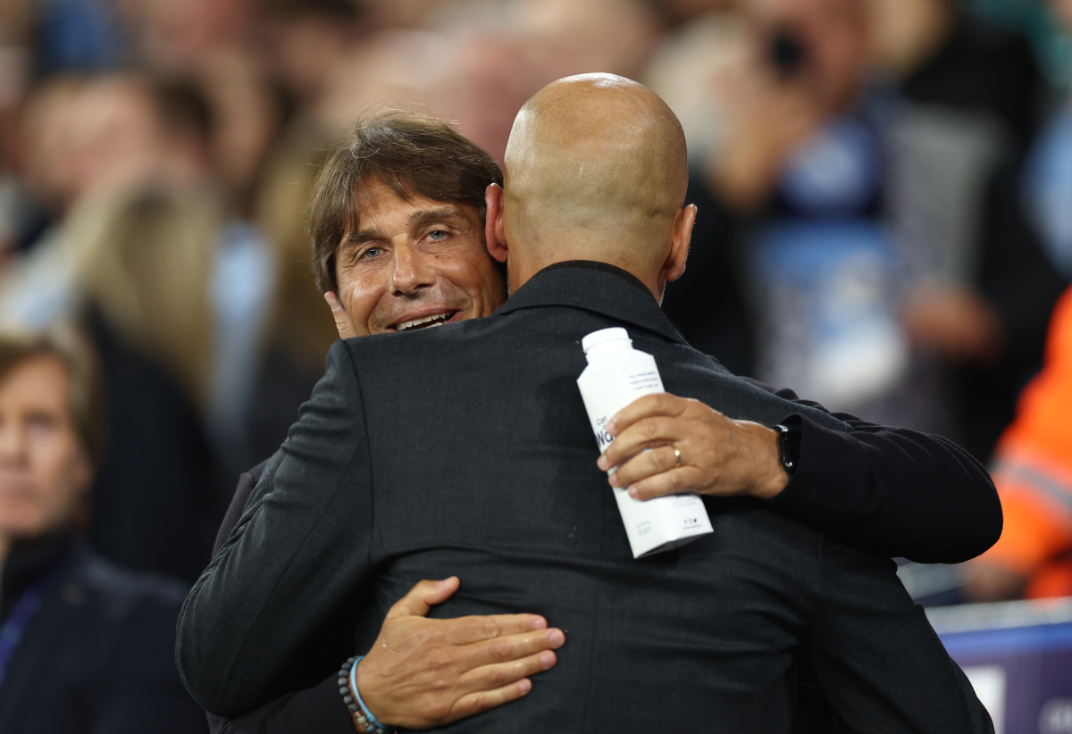 MANCHESTER, ENGLAND - SEPTEMBER 18: Antonio Conte, Head Coach of Napoli, and Pep Guardiola, Manager of Manchester City, embrace prior to the UEFA Champions League 2025/26 League Phase MD1 match between Manchester City and SSC Napoli at City of Manchester Stadium on September 18, 2025 in Manchester, England. (Photo by Dan Istitene/Getty Images)