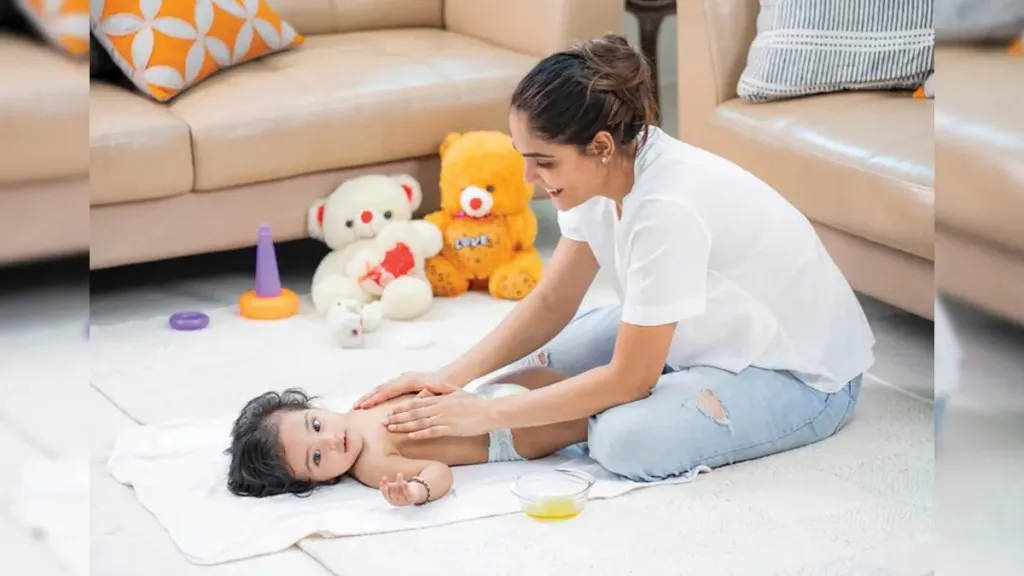 mom giving his baby a gentle massage