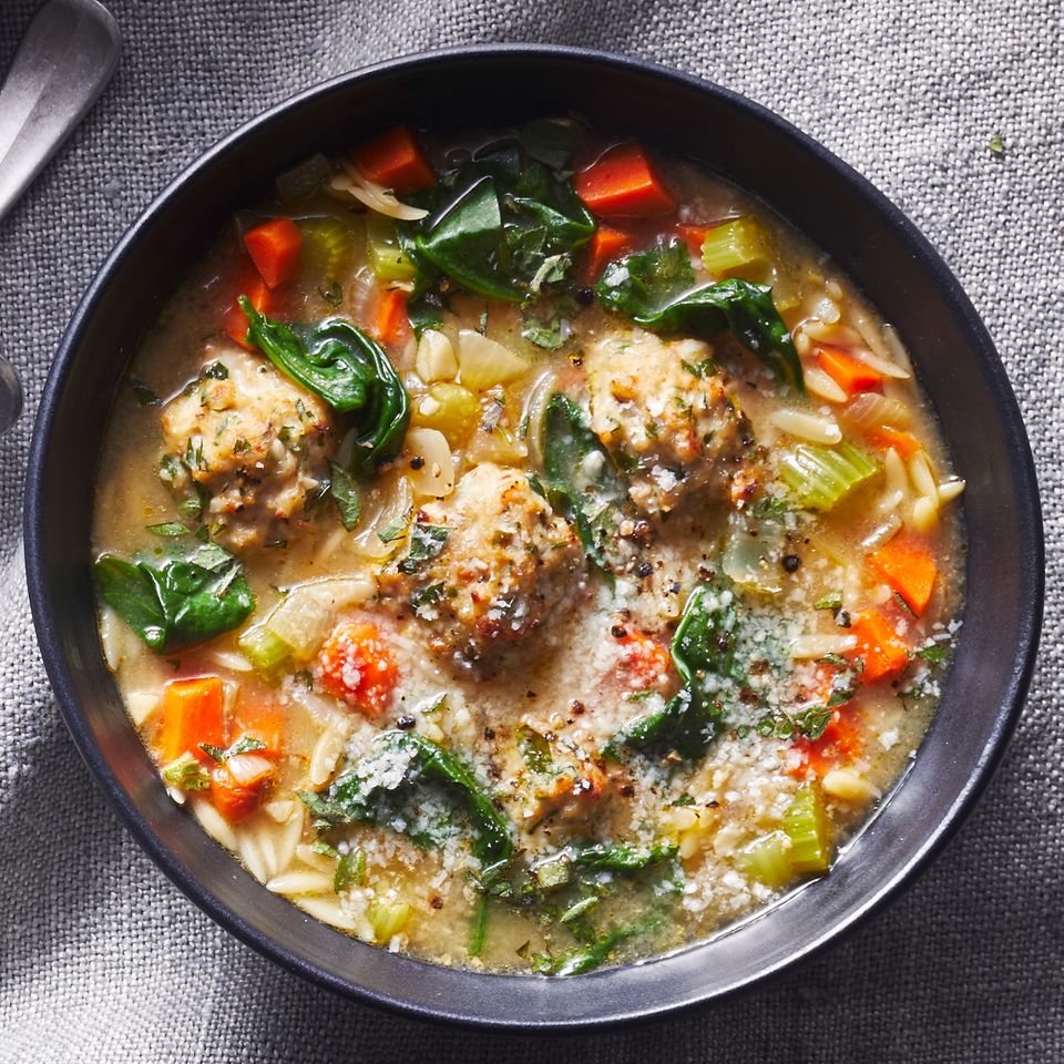 Bowl of Easy Italian Wedding Soup on a gray cloth background Credit: Jennifer Causey