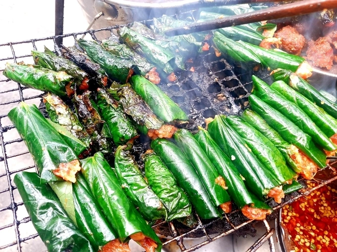 Once grilled, beef wrapped in betel leaf takes on darker shades. Photo by Read/Khanh Thien
