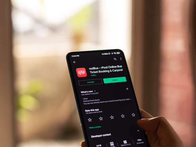 The redBus mobile app helps users search routes, compare fares and book coach tickets more conveniently. Photo courtesy of redBus