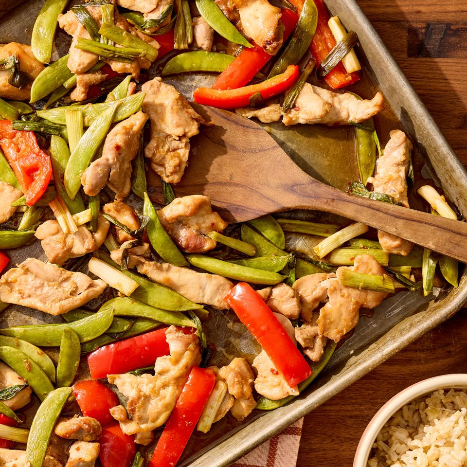 A recipe image of Sheet-Pan Garlic-Soy Chicken & Vegetables. Credit: Photographer: Jake Sternquist, Food Stylist: Shannon Goforth, Prop Stylist: Gabriel Greco.