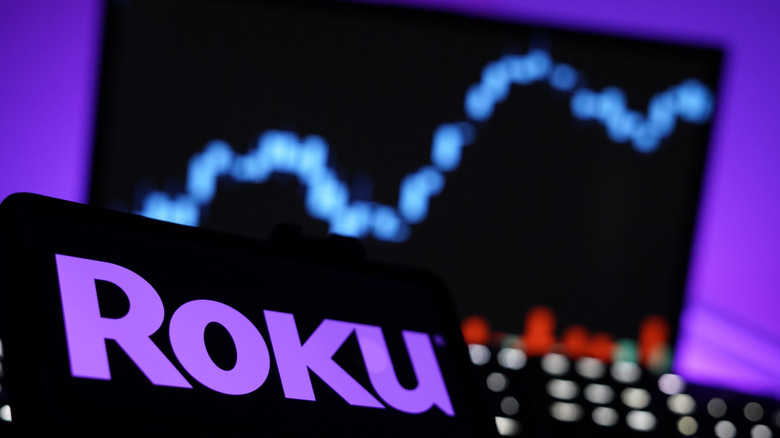 Picture showing Roku logo with chart in background