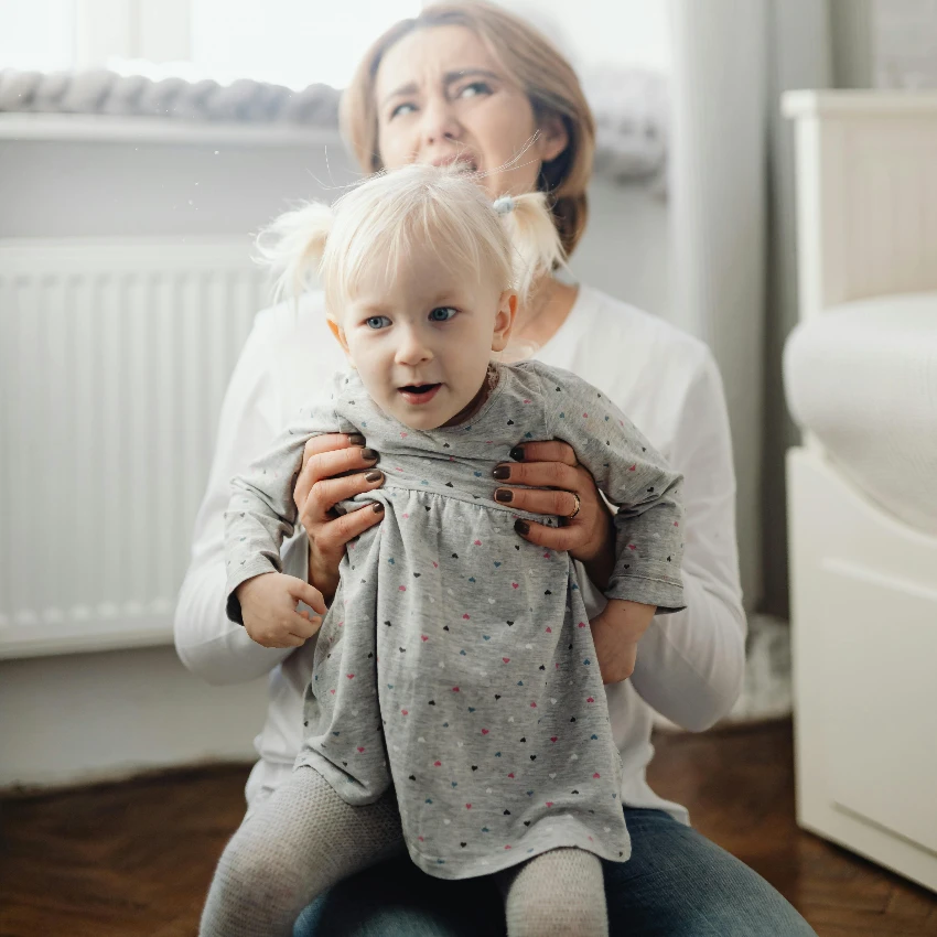 mom trying to respond correctly to her toddler's tantrum