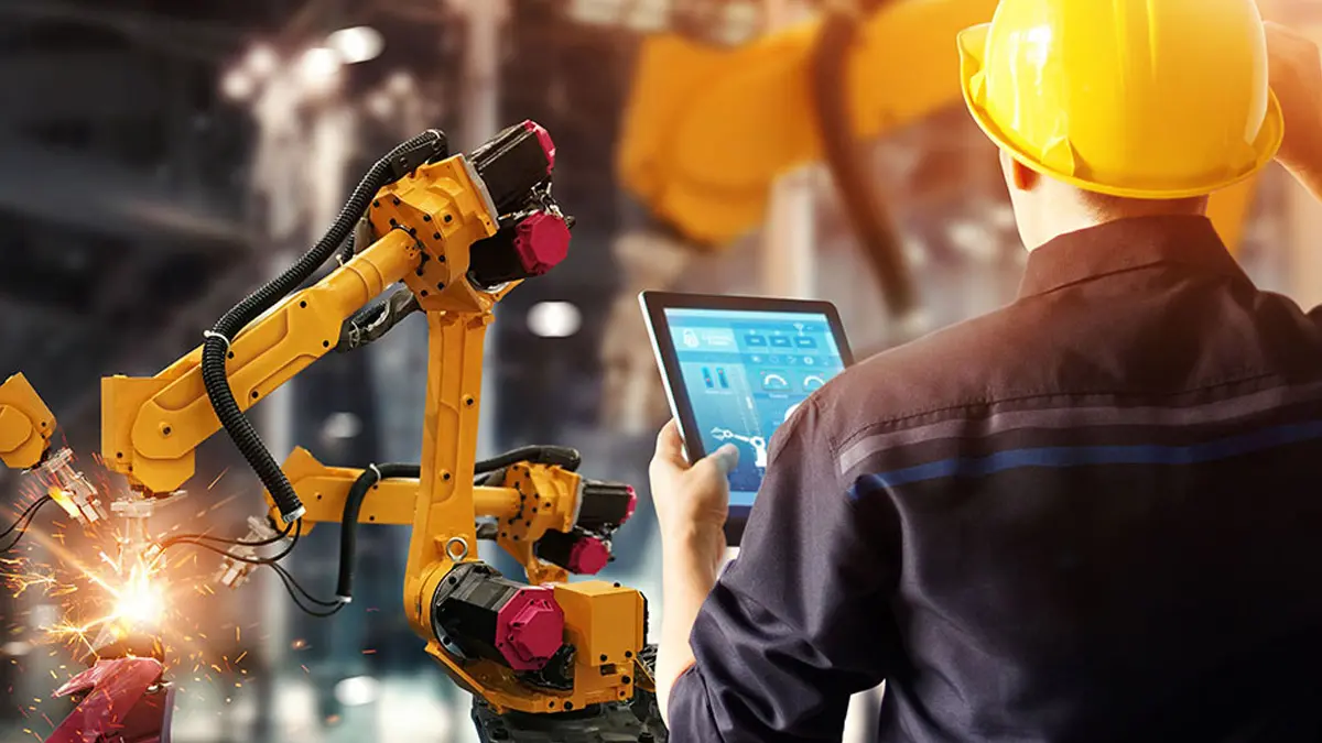 robots assemble car parts AI in manufacturing