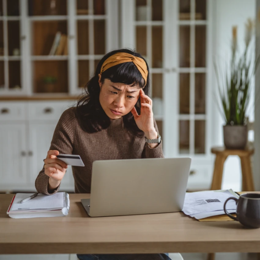 woman who works hard but still struggles to pay bills