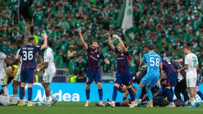 JDT player called for a stretcher to be brought onto the field, while the referee checked the fouled player. Photo: AFC