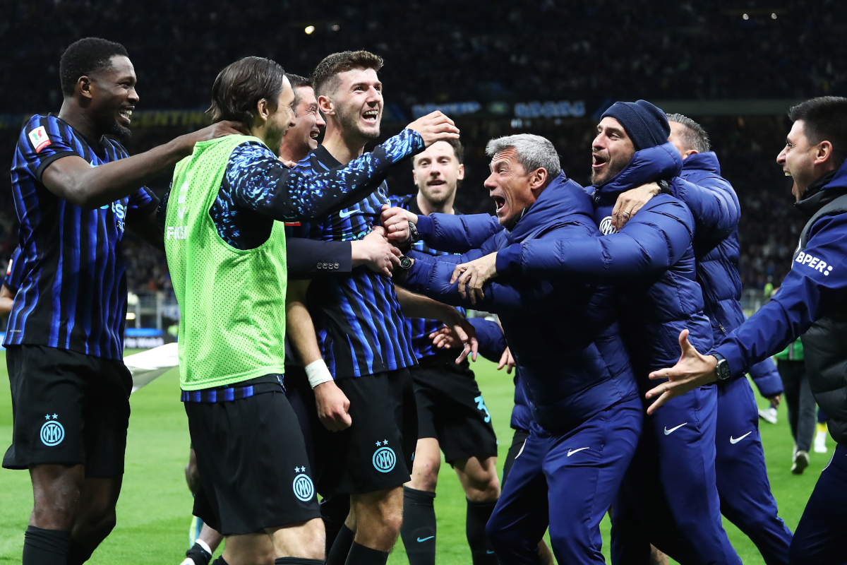 MILAN, ITALY - APRIL 21: Petar Sucic of FC Internazionale Milano celebrates scoring his team's second goal with teammates during the Coppa Italia Semi-Final match between FC Internazionale and Como at San Siro on April 21, 2026 in Milan, Italy. (Photo by Marco Luzzani/Getty Images)