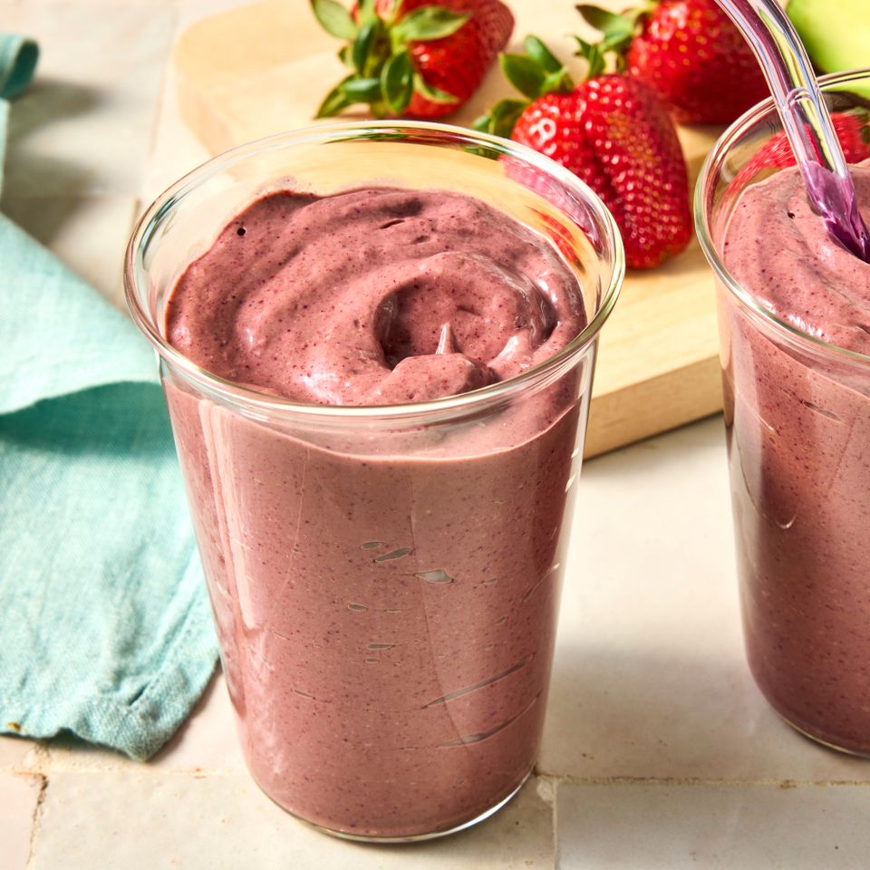A recipe image of Berry-Avocado-Spinach Smoothie Credit: Photographer: Caley Ellenburg, Food Stylist: Emily Nabors Hall, Prop Stylist: Claire Spollen.