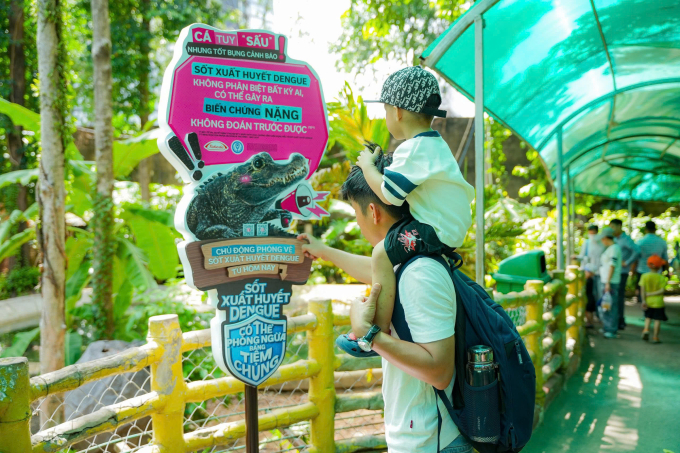 An interactive storytelling station at the Saigon Zoo and Botanical Gardens highlighting the complications of dengue. Photo courtesy of Takeda