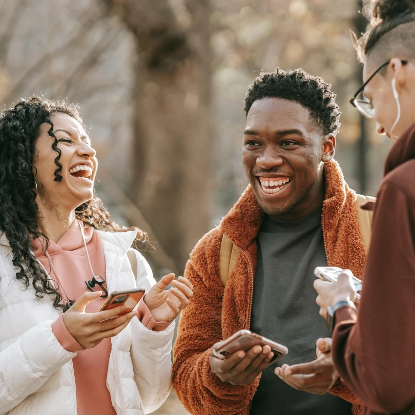 Group of people having a shared experience laughing