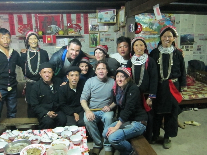A group of foreign guests celebrate Tet with a Dao family. Photo: Louise Murdoch