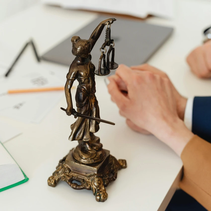 couple holding hands after being sued