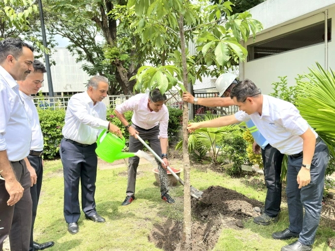Wipros leadership participates in a tree-planting activity at VSIP Factory in Vietnam. Photo courtesy of Wipro