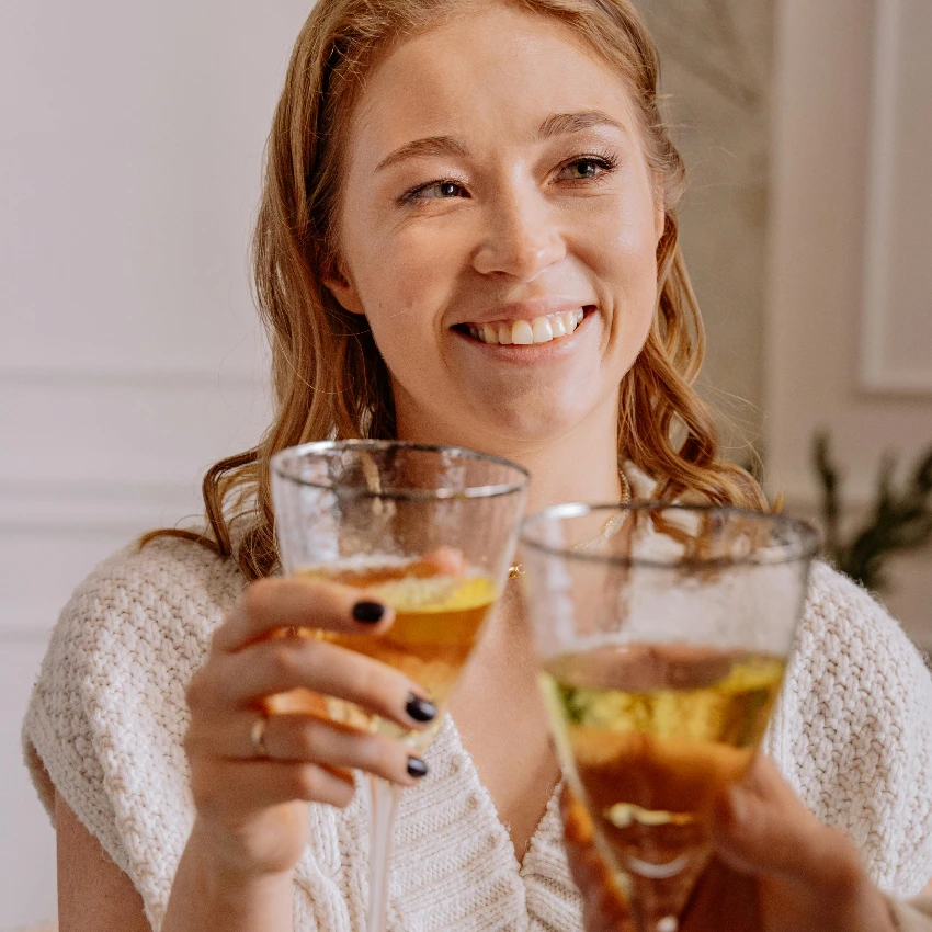 woman drinking alcohol with a friend