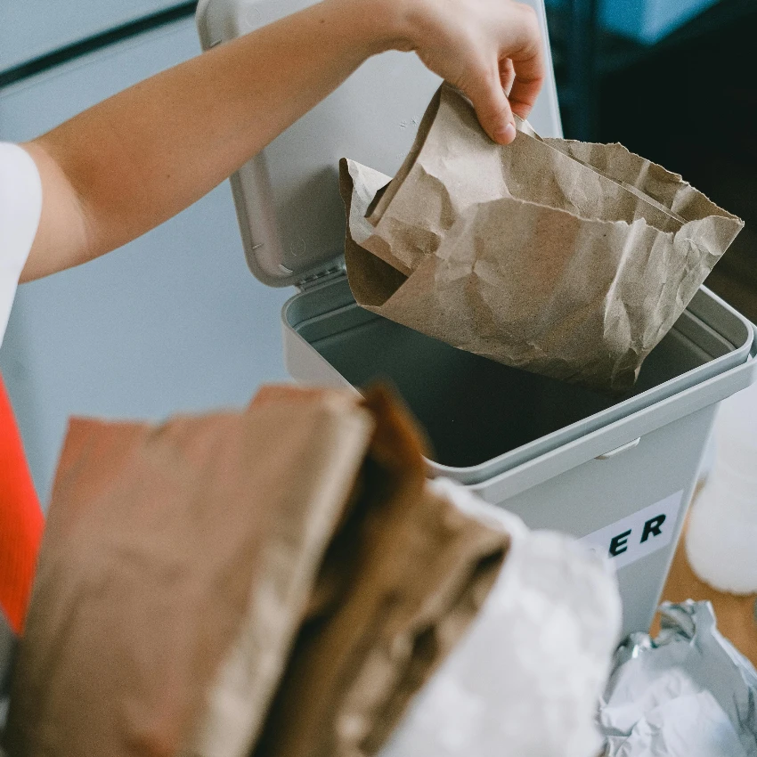 person cleaning up after themselves