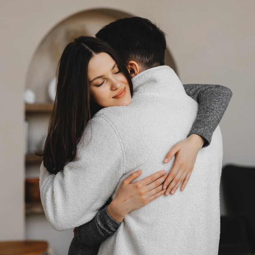 couple who is quick to forgive with a hug but not forget