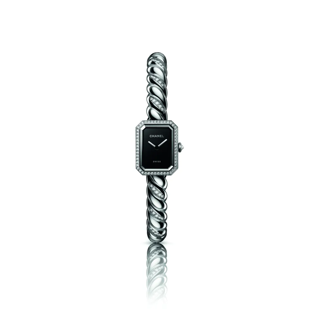 CHANEL PREMIÈRE GALON watch with a black face and diamond-studded case and band.