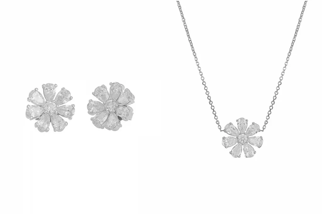 An image collage containing 2 images, Image 1 shows A pair of flower-shaped white gold diamond earrings, Image 2 shows White gold diamond flower pendant necklace