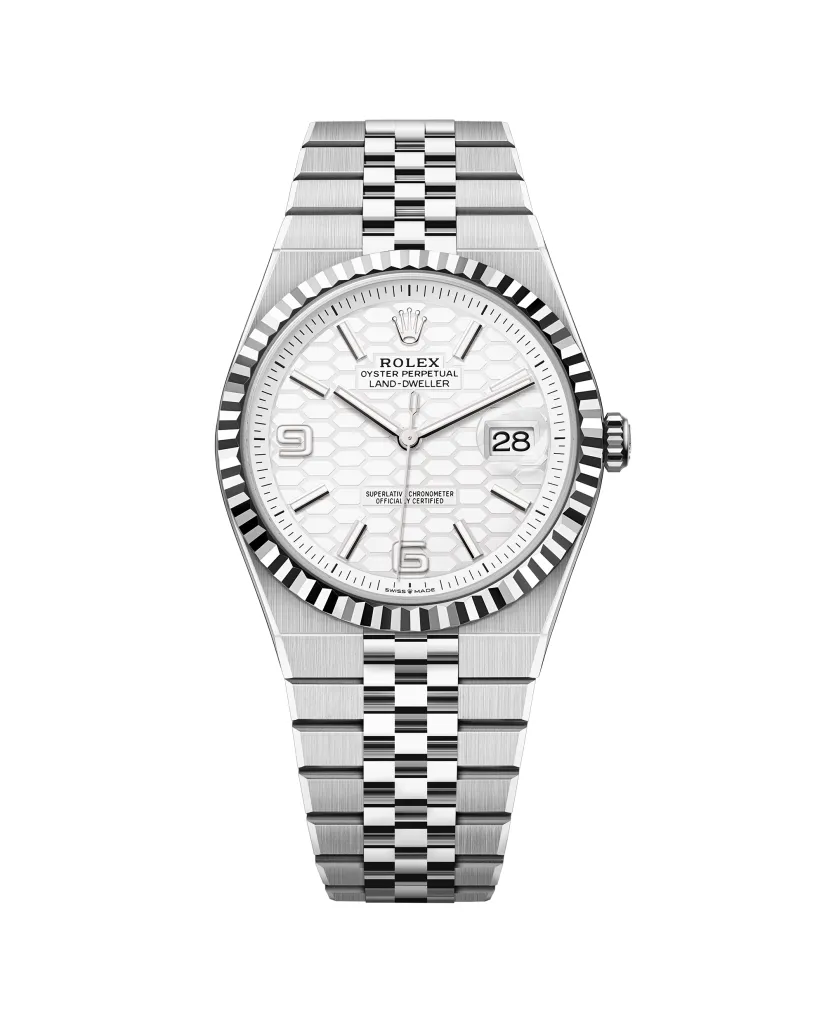 Illustration of a silver Rolex Oyster Perpetual Land-Dweller watch with a white hexagonal pattern face and date window.