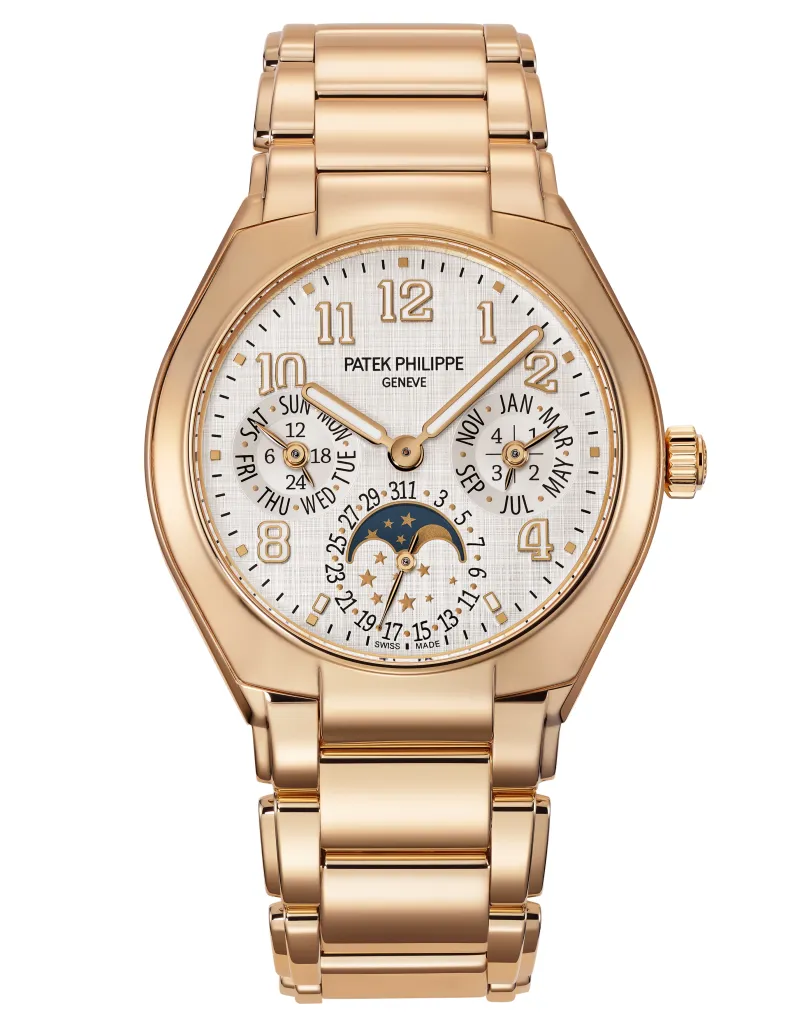 Patek Philippe rose gold watch with a perpetual calendar, moon phase, and textured white dial.