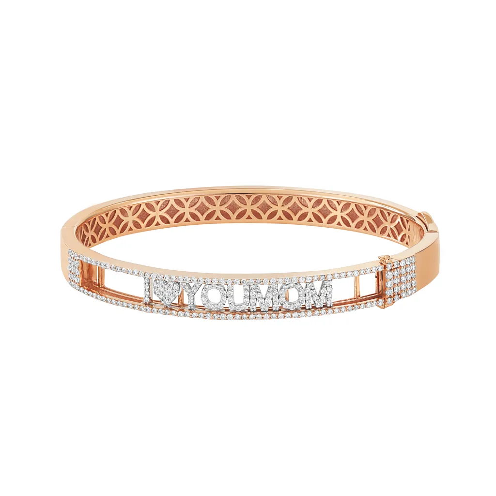 A rose gold bangle bracelet with the words "I LOVE YOU MOM" spelled out in diamonds.