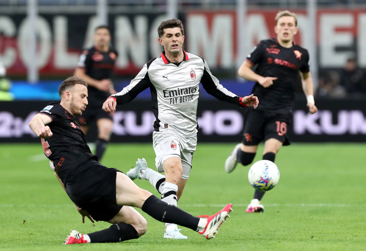 MILAN, ITALY - MARCH 21: Christian Pulisic of AC Milan is challenged by Ardian Ismajli of Torino during the Serie A match between AC Milan and Torino FC at Giuseppe Meazza Stadium on March 21, 2026 in Milan, Italy. (Photo by Marco Luzzani/Getty Images)
