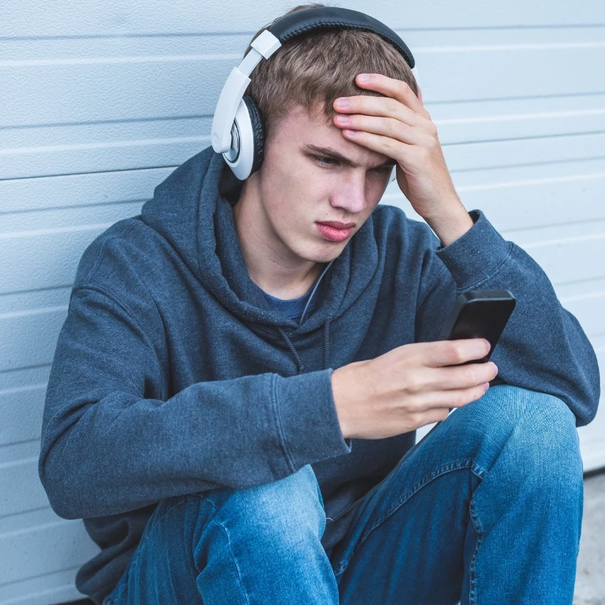 young man without self-awareness using ai as a confidante