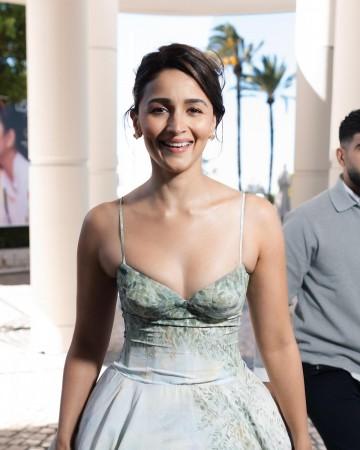 Cannes 2026: Alia Bhatt stuns in plunging neckline, dreamy mint-green gown; exudes Disney princess vibes, poses at French Riviera (Pics)