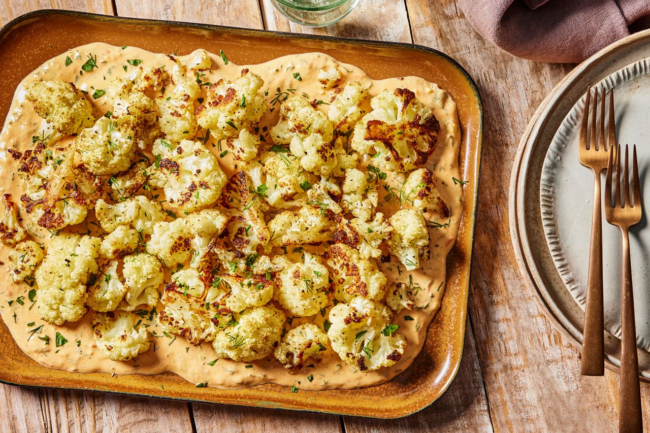 an image of the Roasted Cauliflower with Tahini Credit: Photographer: Morgan Hunt Glaze, Prop Stylist: Lydia Pursell, Food Stylist: Jennifer Wendorf