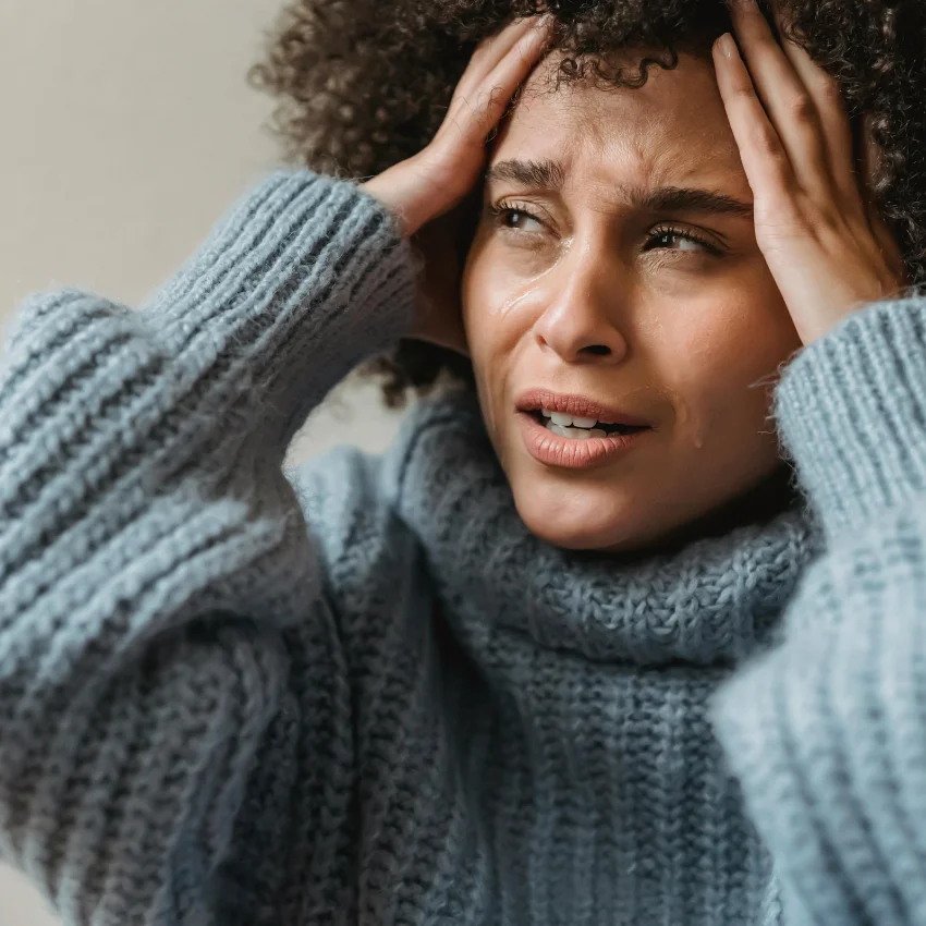 woman feeling trauma from a past life