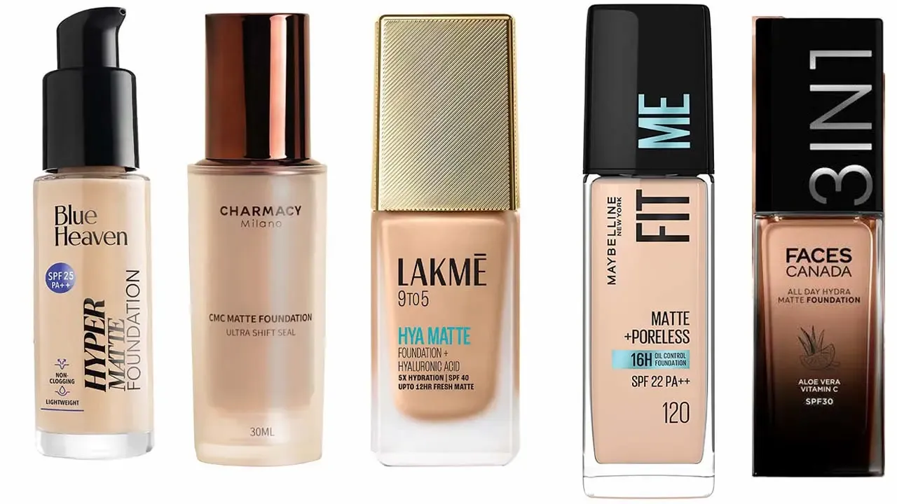 A studio lineup of five popular liquid foundations from drugstore brands sold in India, arranged neatly against a plain white background. From left to right: a clear glass bottle with a black pump of Blue Heaven Hyper Matte Foundation, a sleek frosted glass bottle of Charmacy Milano CMC Matte Foundation (Ultra Shift Seal, 30ml), a rectangular bottle with a ribbed gold cap of Lakme 9to5 Hya Matte Foundation, a classic clear square bottle of Maybelline New York Fit Me Matte + Poreless Foundation (Shade 120, SPF 22), and a dark rectangular bottle of Faces Canada 3 in 1 All Day Hydra Matte Foundation