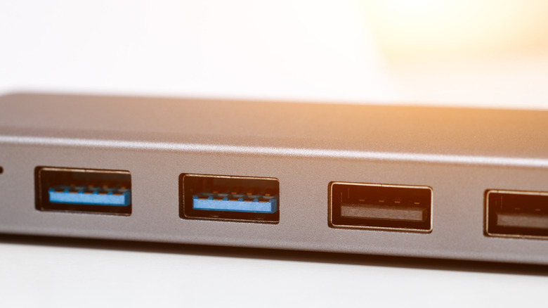 A USB-A hub that has 4 USB-A ports; 2 blue, and 2 black