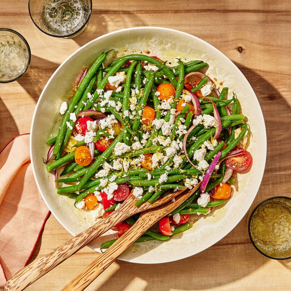 a recipe photo of the Green Bean Salad with Balsamic & Tomatoes Credit: Photographer: Morgan Hunt Glaze, Prop Stylist: Lydia Pursell, Food Stylist: Emily Nabors Hall