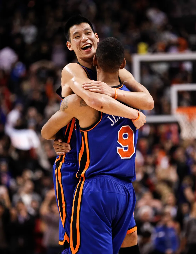 Jeremy Lin #17 of the New York Knicks celebrates with Jared Jeffries #9 after the win over the Toronto Raptors at the Air Canada Centre February 14, 2012 in Toronto, Ontario, Canada.