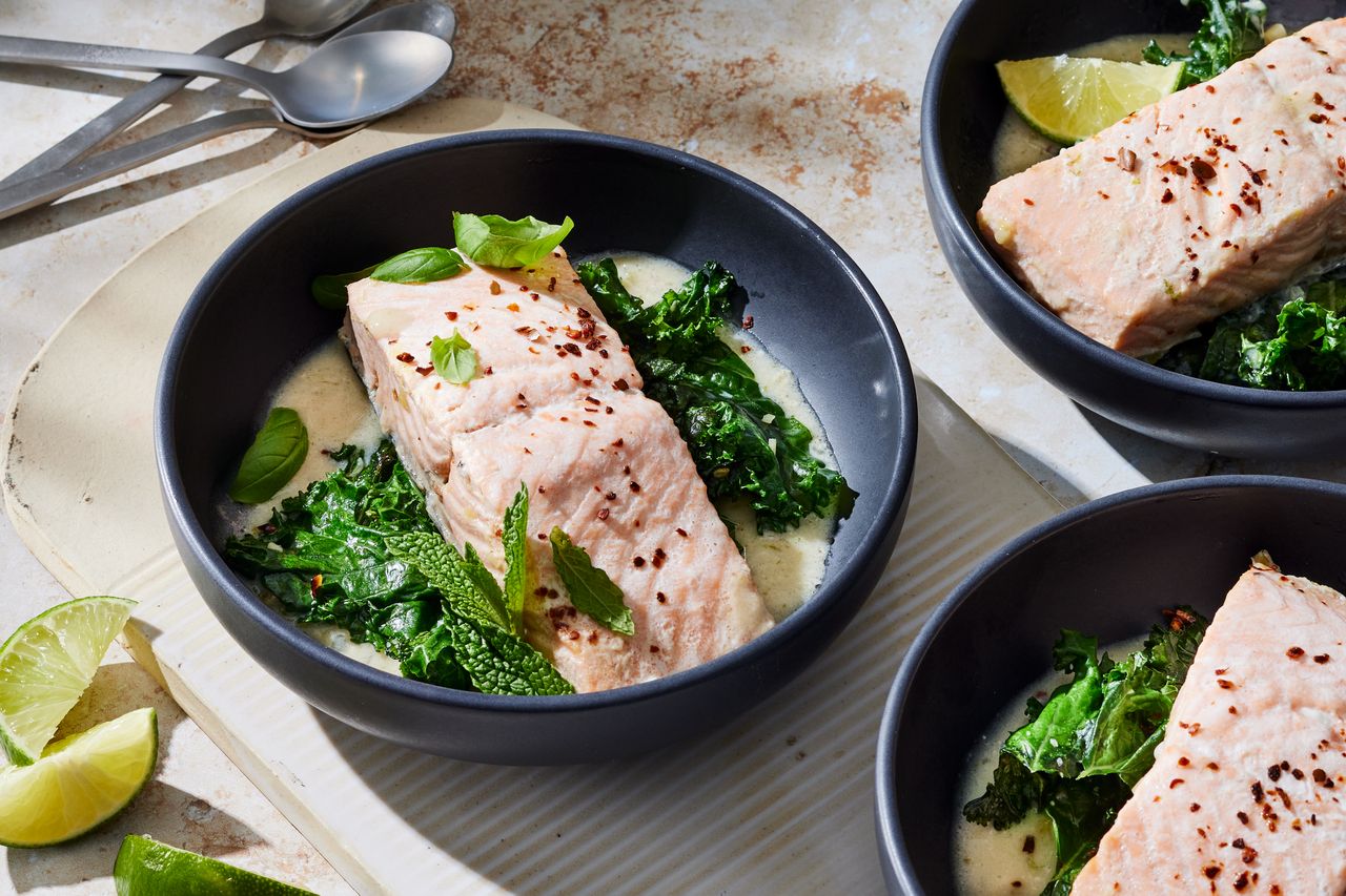 a recipe photo of the Lemongrass & Coconut Poached Salmon Credit: Photographer: Rachel Marek, Prop stylist: Holly Dreesman, Food stylist: Gabriel Greco