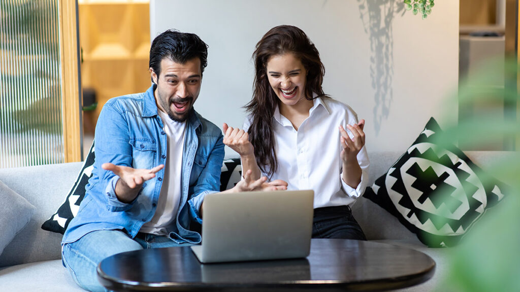 happy mates using laptops Rugged laptops