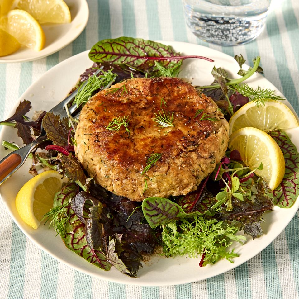 A recipe image of Easy Salmon Cakes with Greens Credit: Photographer: Jen Causey.