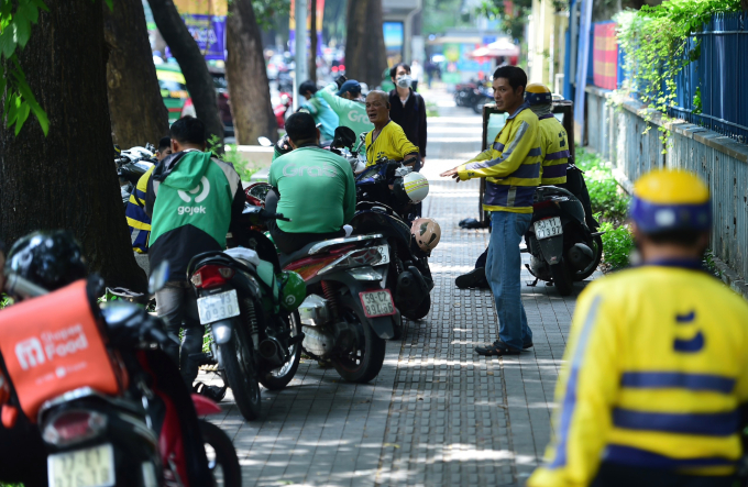 Technology car driver in the center of Ho Chi Minh City in 2025. Photo: Thanh Tung