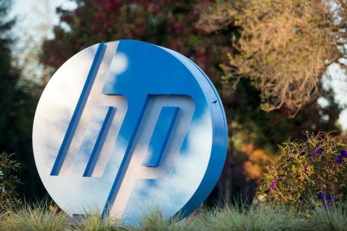 (File photo) The HP logo is seen on a sign at Hewlett Packard's headquarters in Palo Alto, California on November 4, 2016. / AFP / JOSH EDELSON US-TECHNOLOGY-HP