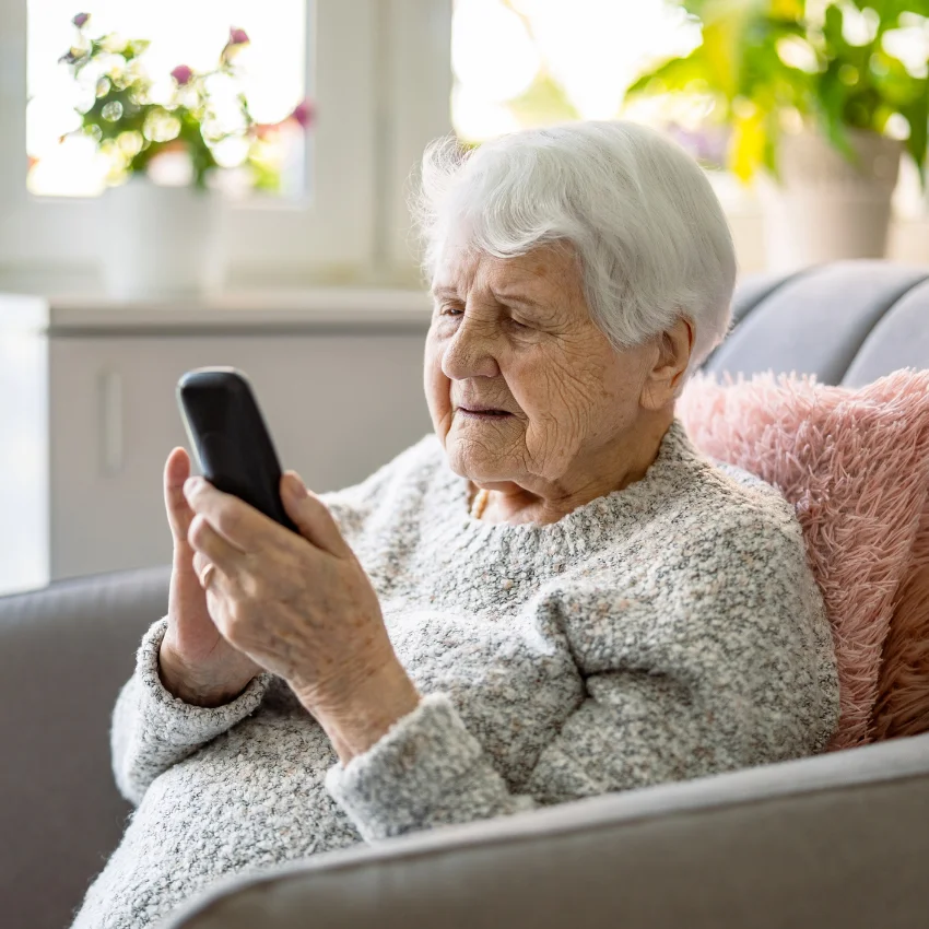 elderly woman who doesn't understand media literacy